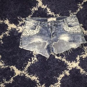 Ripped almost famous shorts size 11